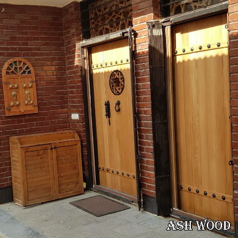 ساخت و نصب درب تمام چوب راش سبک سنتی با گره چینی 