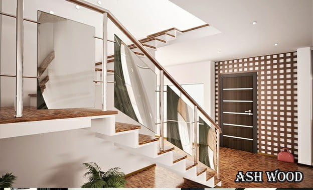 با این طرح های خیره کننده راه پله های چوب و شیشه ای ، ظاهری مدرن به خانه خود اضافه کنید