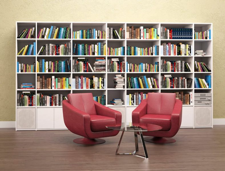 کتابخانه با قفسه سفید و صندلی قرمز